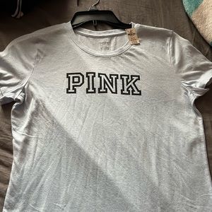 Size medium PINK by Victoria’s Secret loose fitting T-shirt.